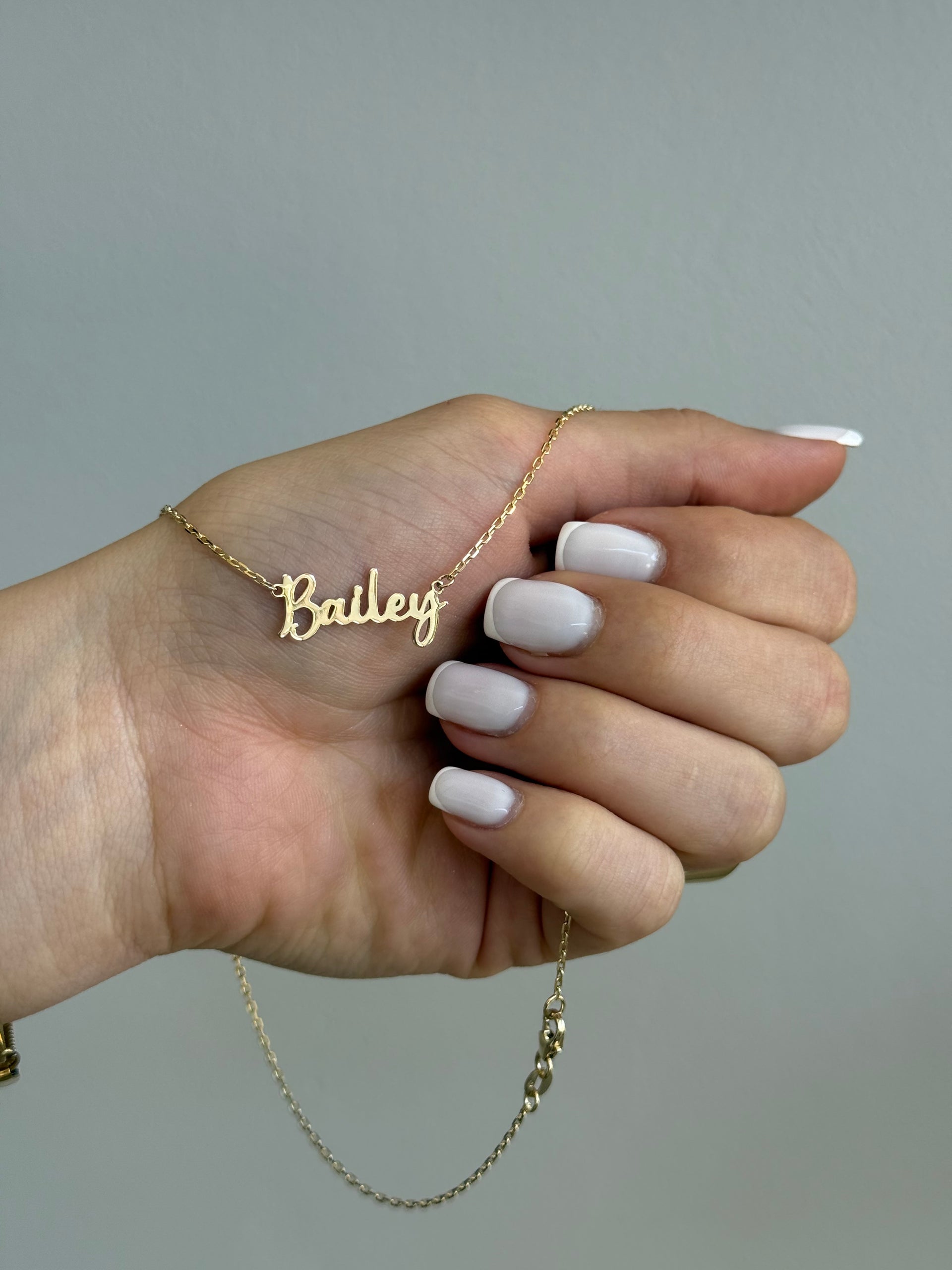 Cut out name pendant